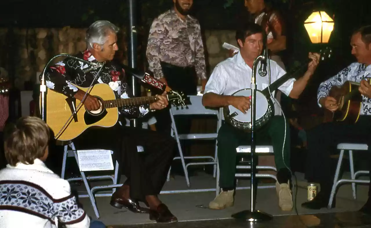 Garner_Ted_Armstrong_playing_guitar,_1979